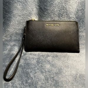 Michael Kors MK- Gently used wristlet (OUT OF TOWN FOR CHRISTMAS)